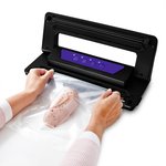 Вакуумный упаковщик Kitfort КТ-1528-1 110Вт 0.55Бар шир.пак.:28см черный/фиолетовый