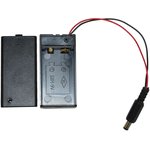 Battery compartment for a 9V crown battery with ON/OFF button and plug