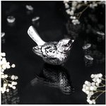 Мебельная ручка фурнитура Птичка Терра правая серебристого цвета 90047/серебро